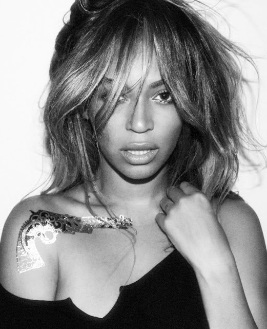 beyonce gun tattoo